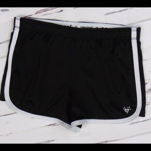 Black and white sports shorts for kids.